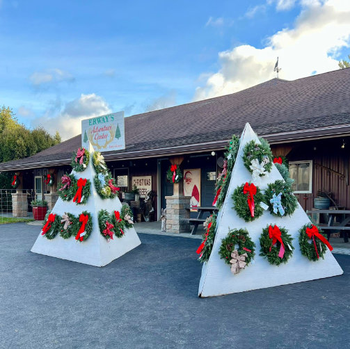 Outside of lodge with wreath holders